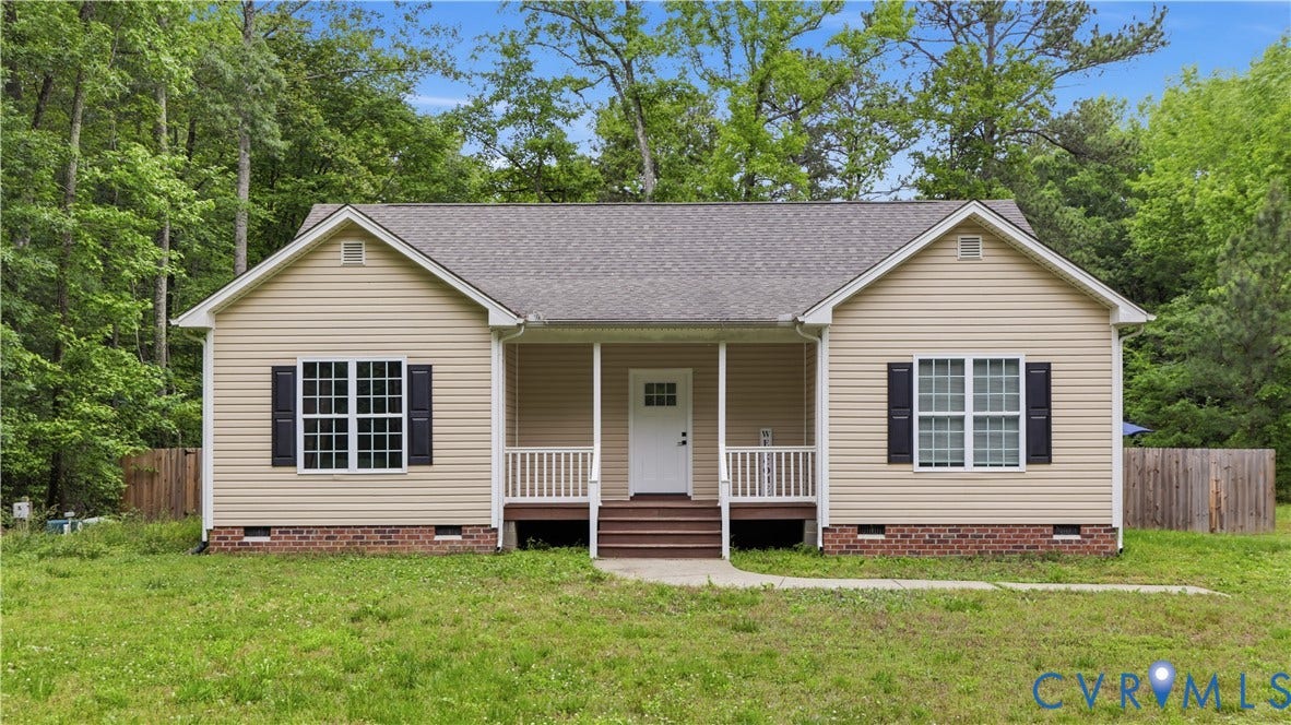 2406 Emanuel Church Road, Powhatan, VA 23139 Ranch-style residence featuring light-toned siding, a covered front porch, and dark louvered shutters