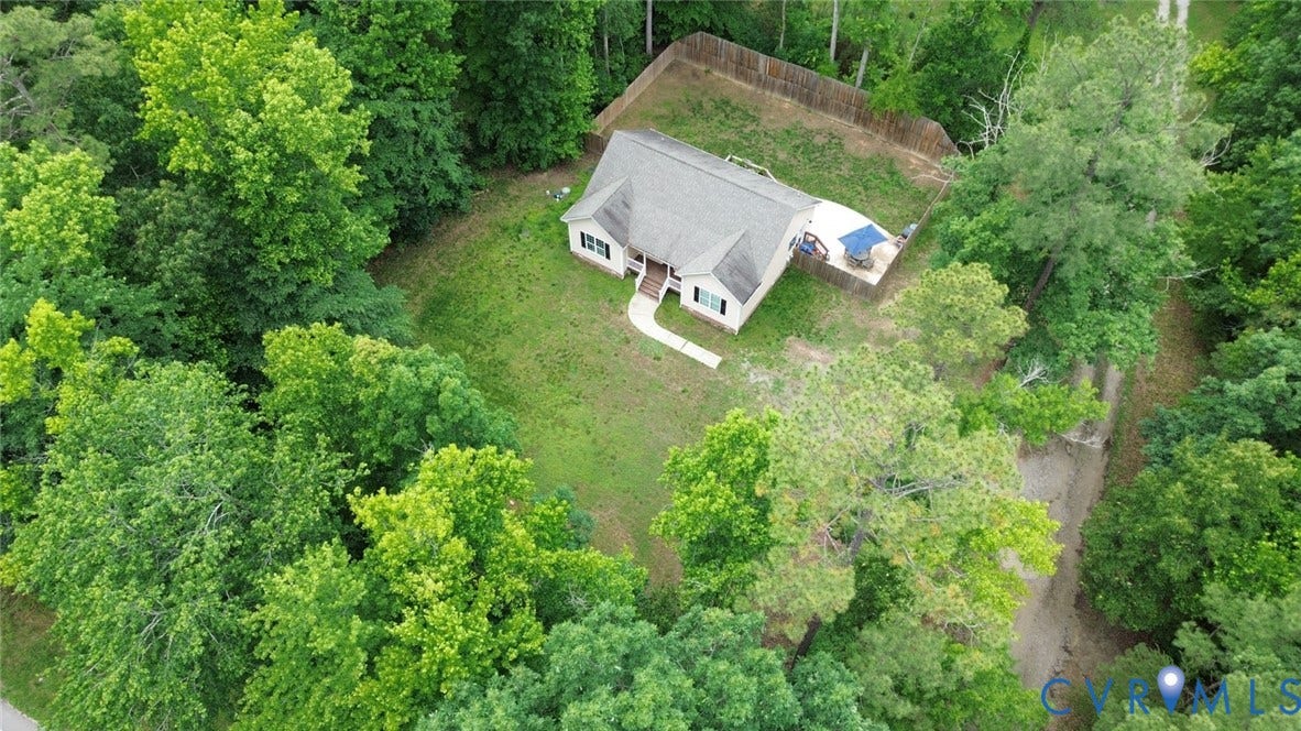 2406 Emanuel Church Road, Powhatan, VA 23139 Single-story property featuring a front porch with white columns, a gray shingle roof, and dark shutters