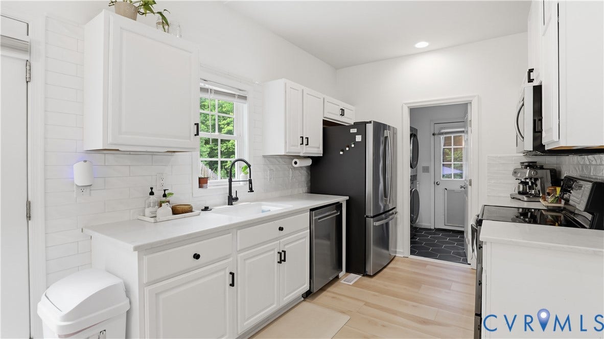 2406 Emanuel Church Road, Powhatan, VA 23139 Kitchen featuring white cabinetry, light-tone wood-finish flooring, white countertops, and a white subway tile backsplash