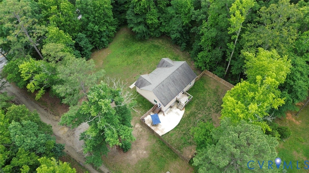 2406 Emanuel Church Road, Powhatan, VA 23139 Single-story residence featuring a gray shingle roof and light-colored siding