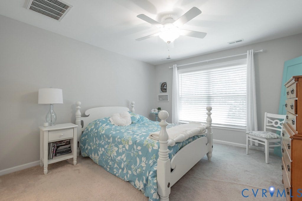 1046 Orchid Road, Mineral, VA 23117 Primary Bedroom with carpet, double window and ceiling fan.