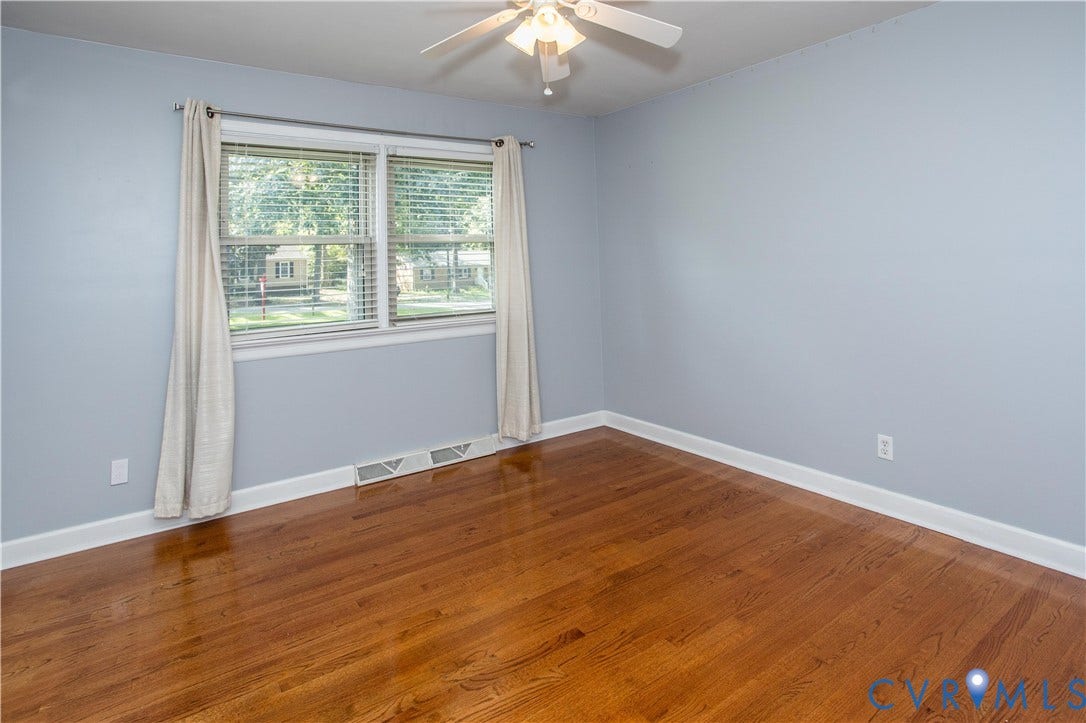 4512 Wraywood Avenue, Preston Place, Chester, VA 23831 Wood-finish flooring, light blue walls, and a ceiling fan
