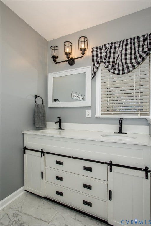 4512 Wraywood Avenue, Preston Place, Chester, VA 23831 Dual vanity with white cabinetry and black barn door hardware, white countertops, black matte faucets, and a three-light fixture