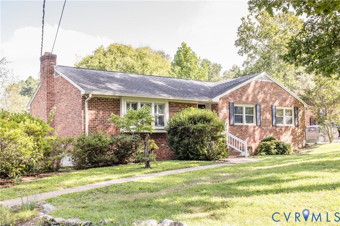 4512 Wraywood Avenue, Preston Place, Chester, VA 23831 Brick exterior with a prominent chimney and white window trim