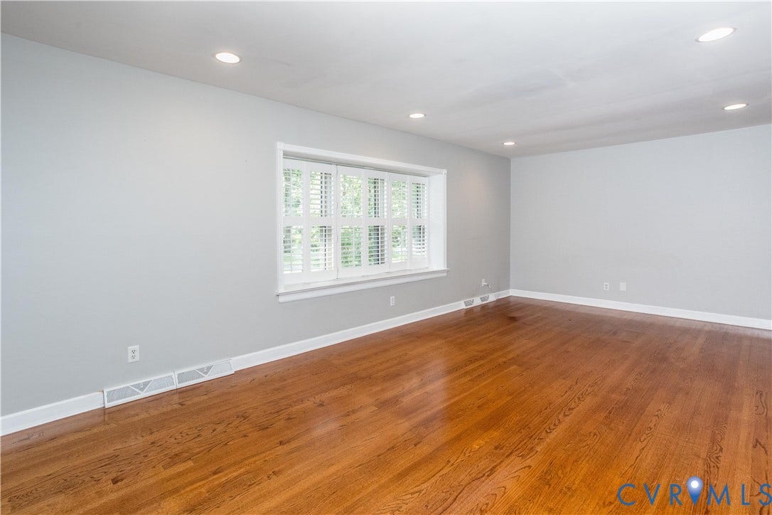 4512 Wraywood Avenue, Preston Place, Chester, VA 23831 Hardwood flooring throughout, recessed lighting, and a window with plantation shutters