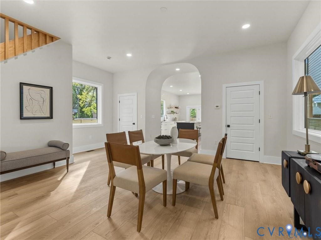 2200 3rd Avenue, Northside, Richmond, VA 23222 Dining room with arched walkways, plenty of natural light, light wood-style flooring, and recessed lighting
