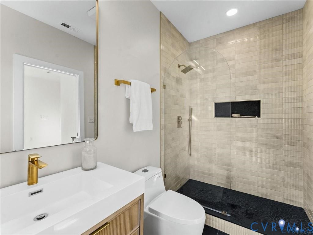 2200 3rd Avenue, Northside, Richmond, VA 23222 Bathroom featuring vanity, walk in shower, and recessed lighting