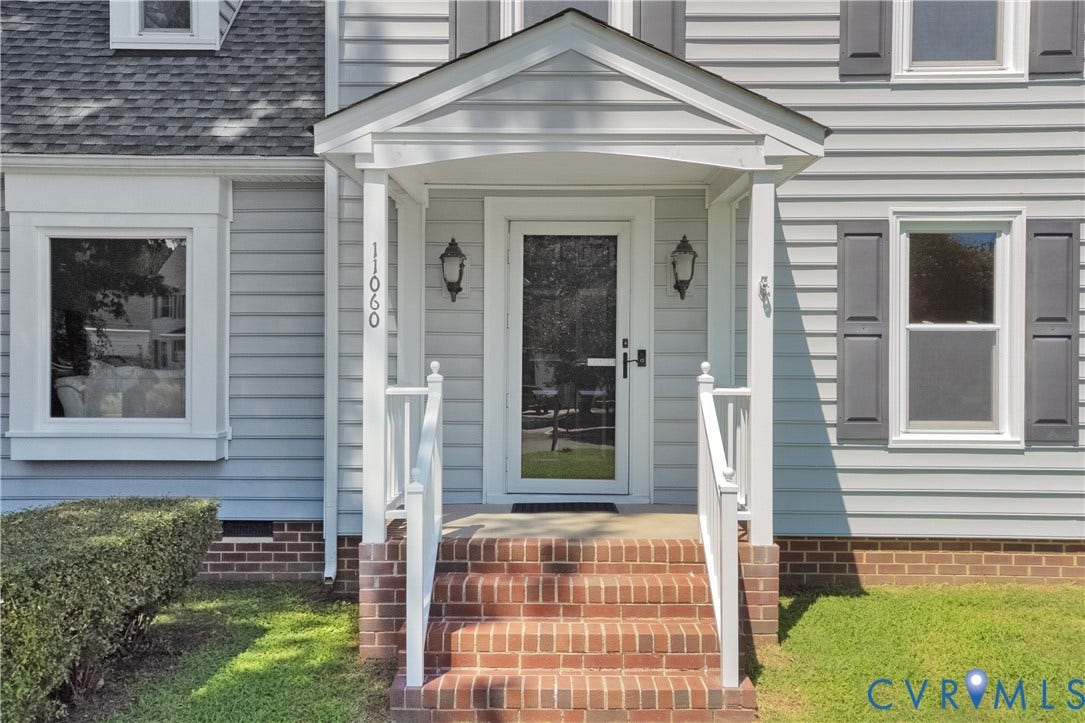 11060 Forest Trace Way, Forest Trace, Glen Allen, VA 23059 Light gray siding exterior with a covered entry, brick stairs, and white railings