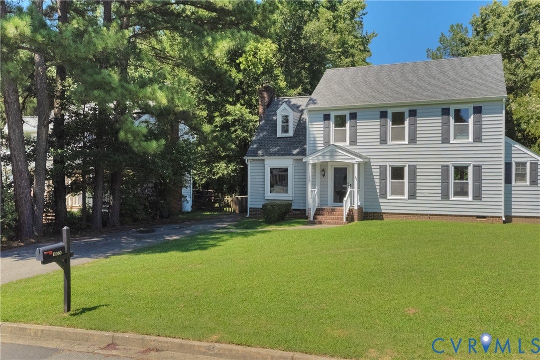 11060 Forest Trace Way, Forest Trace, Glen Allen, VA 23059 Classic Colonial-style residence featuring white siding, a brick front walkway, and a manicured lawn with mature shade trees