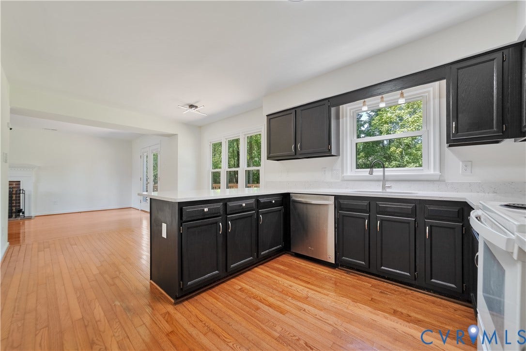 11060 Forest Trace Way, Forest Trace, Glen Allen, VA 23059 Kitchen featuring dark cabinetry, light-toned countertops, a stainless steel dishwasher, and wood-finish flooring