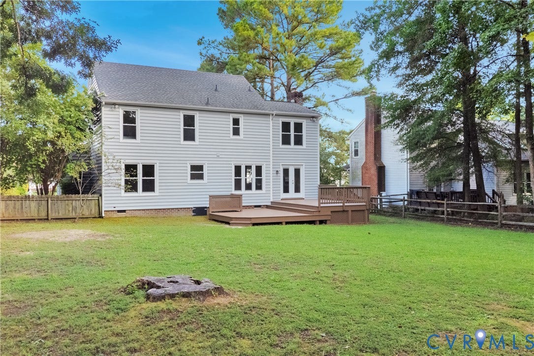11060 Forest Trace Way, Forest Trace, Glen Allen, VA 23059 Expansive backyard featuring a large wood-finish deck, light gray siding, and multiple windows