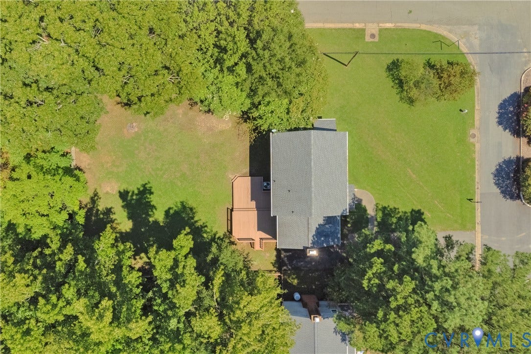 11060 Forest Trace Way, Forest Trace, Glen Allen, VA 23059 Property featuring a grey shingle roof, a multi-level wood deck, and an expansive lawn