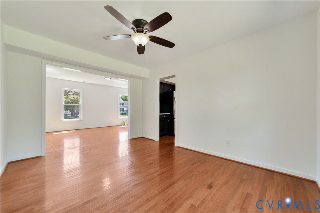 11060 Forest Trace Way, Forest Trace, Glen Allen, VA 23059 Hardwood flooring throughout, ceiling fan with integrated lighting, white painted walls, and an open doorway to an additional room