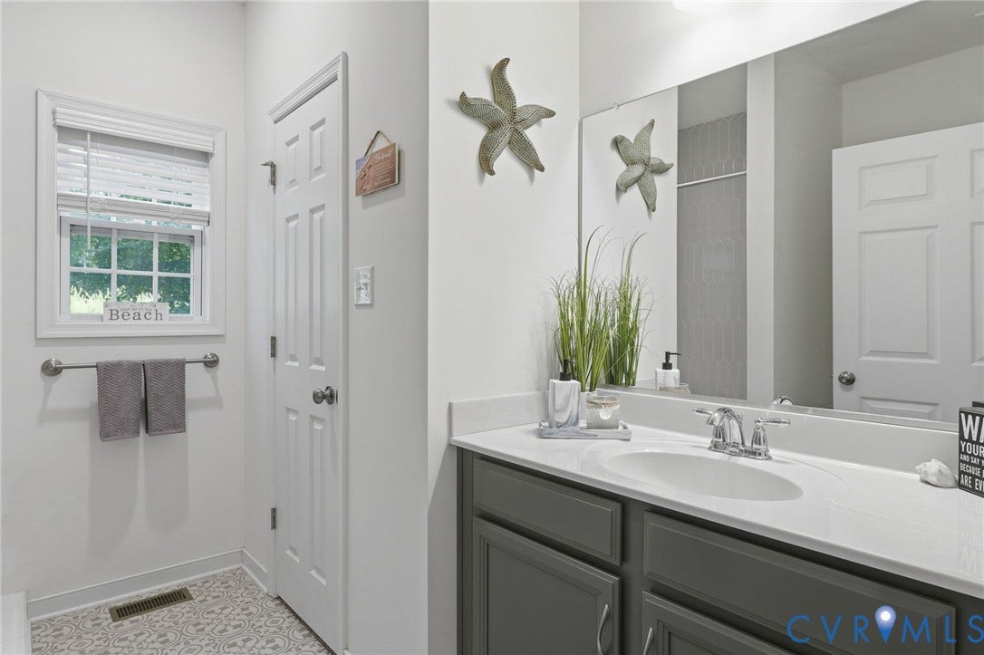 Full bath on main level with large bath/shower