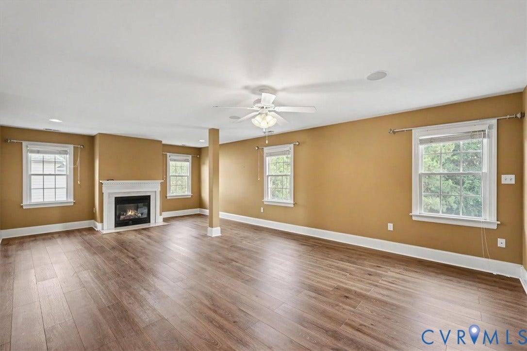 5905 Covington Hills Lane, Nuckols Road Corridor, Glen Allen, VA 23059 Primary bedroom with gas fireplace and new LVP flooring.