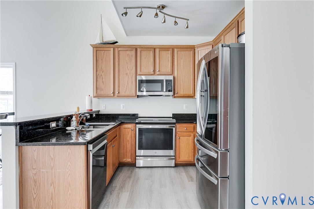 2244 Thomas Kenney Drive, Henrico, VA 23060 Kitchen Featuring an Electric Range with Induction Oven.