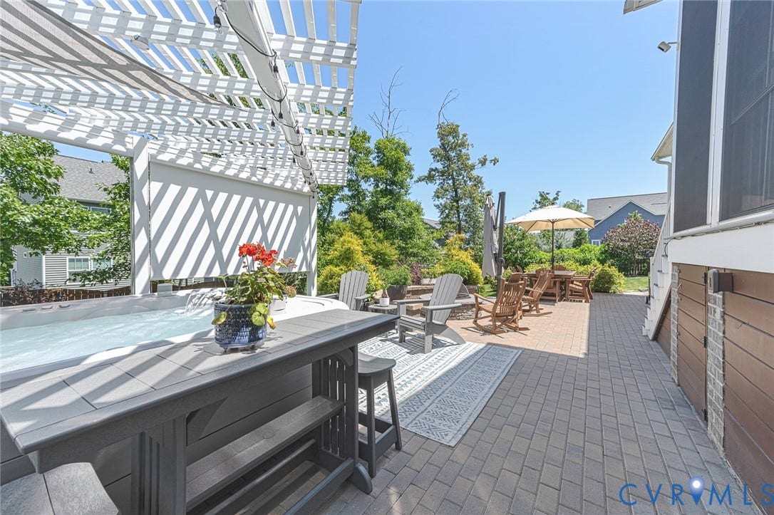 2112 Avada Drive, Newmarket Estates, Midlothian, VA 23112 Custom Stone Patio with Storage Area that has vapor barrier and lighting under Porch