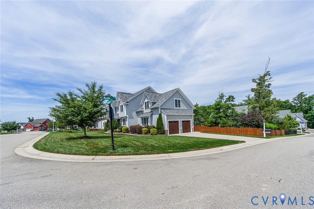2112 Avada Drive, Newmarket Estates, Midlothian, VA 23112 Subject corner lot view with long double wide driveway and 2 garage doors