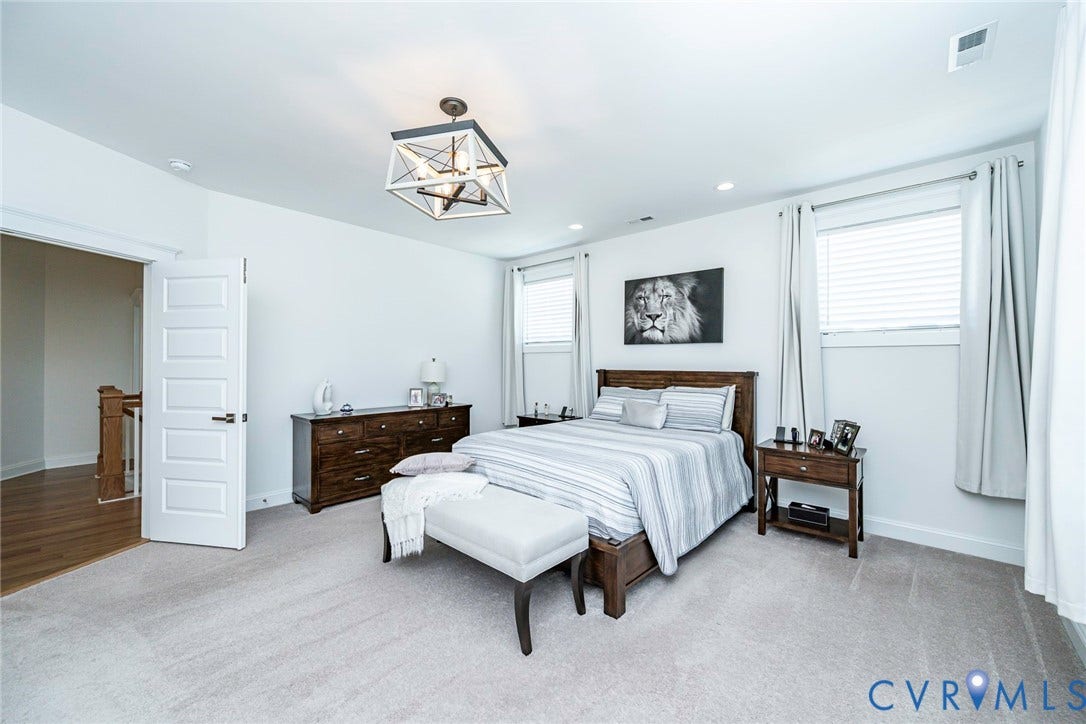 2112 Avada Drive, Newmarket Estates, Midlothian, VA 23112 Primary Bedroom 1 on 2nd Level with carpet, double door access, ceiling chandelier, recessed lighting& light switch next to bed