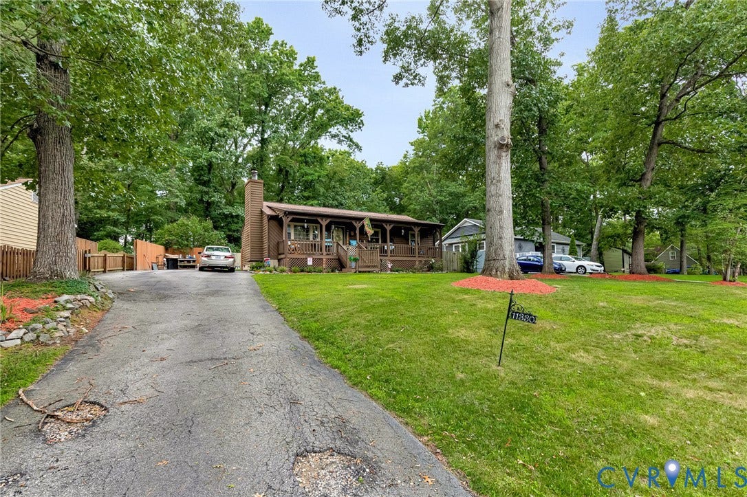 11330 Great Branch Drive, Chester, VA 23831 Ranch-style exterior with a covered front porch and a brick chimney