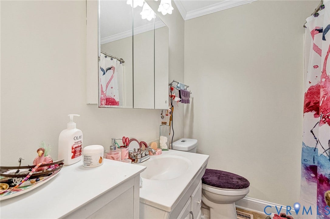 11330 Great Branch Drive, Chester, VA 23831 Full bathroom featuring a white vanity with integrated sink, chrome faucet, medicine cabinet with mirrored doors, and crown molding