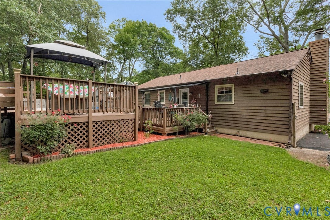 11330 Great Branch Drive, Chester, VA 23831 Expansive rear deck featuring a gazebo structure, wood railings, and lattice skirting
