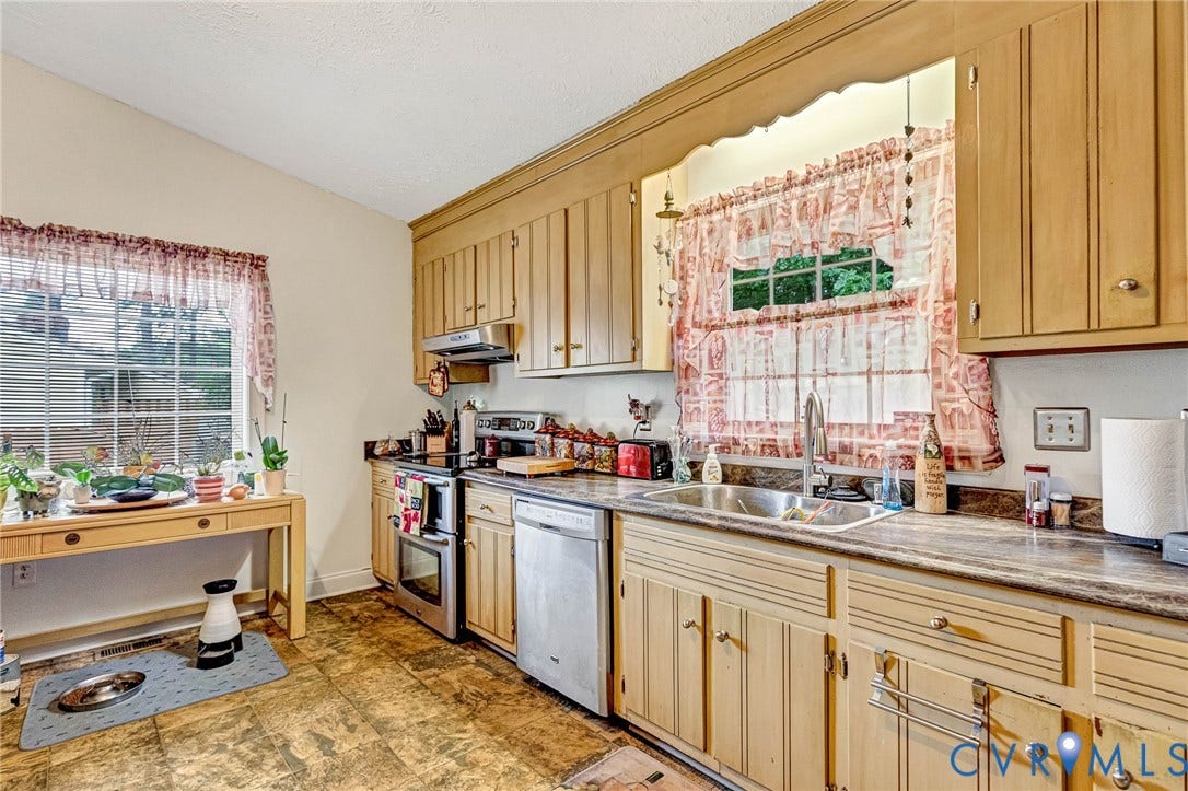11330 Great Branch Drive, Chester, VA 23831 Kitchen featuring natural wood cabinetry, laminate countertops, a double basin stainless steel sink, a stainless steel oven/range, and a dishwasher