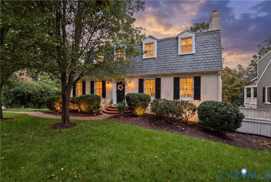 5418 Cary Street Road, Richmond, VA 23226 Dutch Colonial exterior featuring a gambrel roof, dormer windows, brick facade, and dark shutters