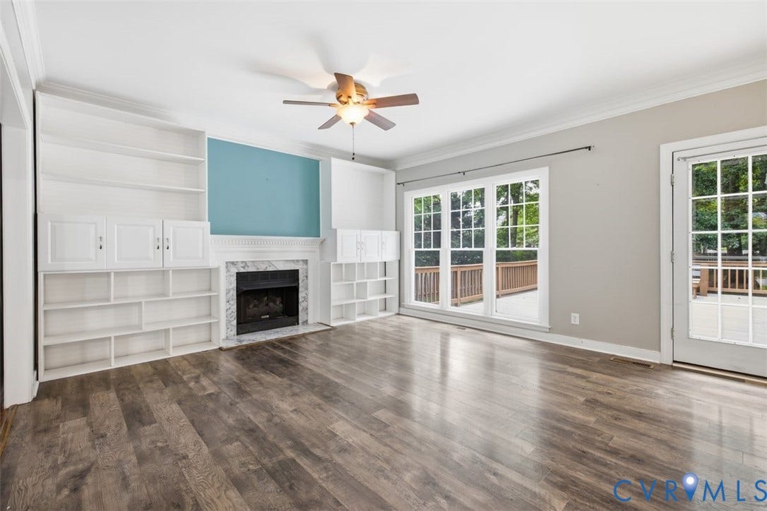 The family room is the perfect gathering spot!  Look at all the natural light that flows in to the room!