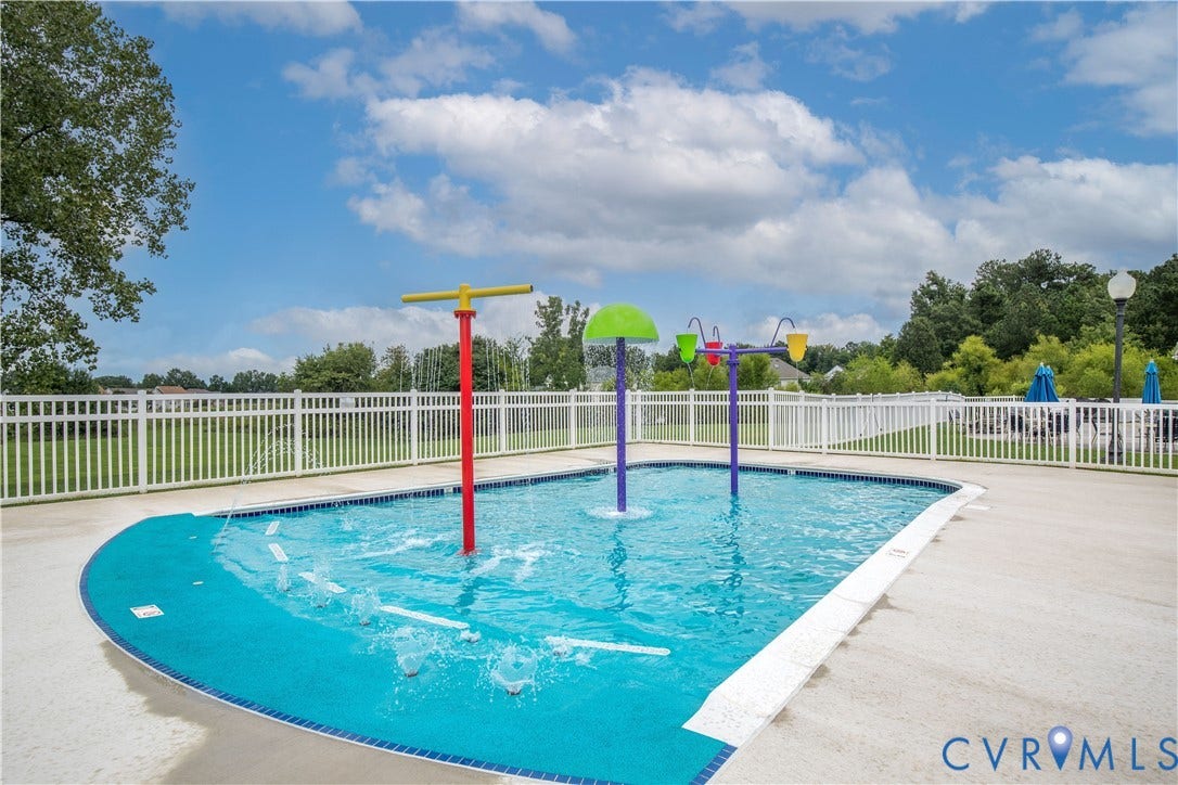 And finally, check out the pool! Your HOA This close-up shot shows the newly installed splash pad with zero-entry!