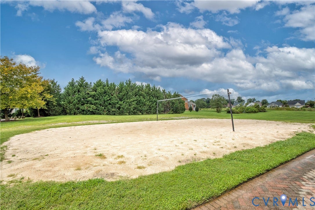 The volleyball court is also located by the pool. Great spot for a pick-up game!