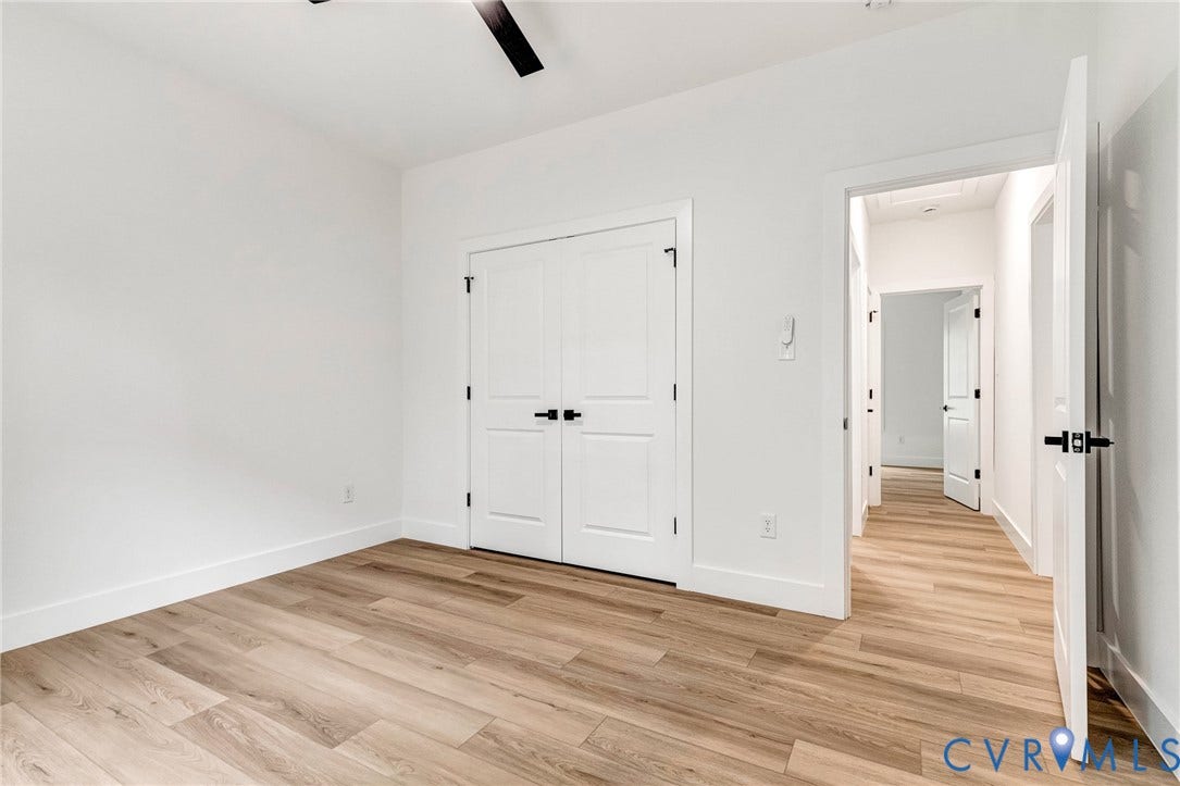 716 Pine Harbour Drive, Pine Harbour, Mineral, VA 23117 Bright room with wood-finish flooring and white walls