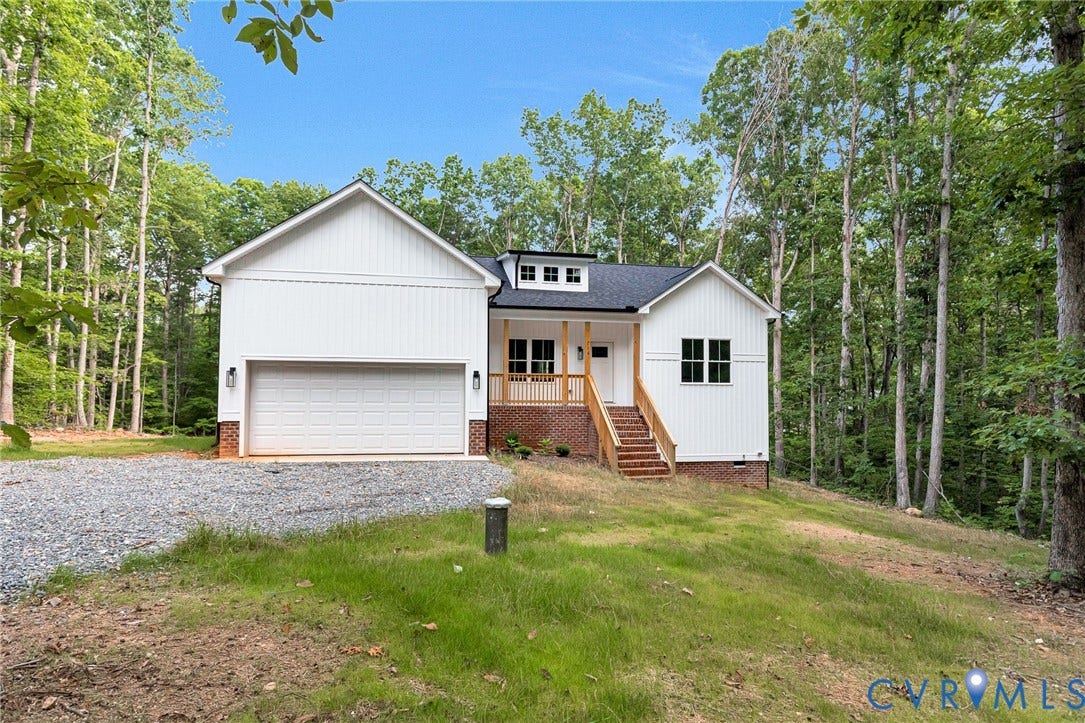 716 Pine Harbour Drive, Pine Harbour, Mineral, VA 23117 Modern farmhouse-style home with white board-and-batten siding