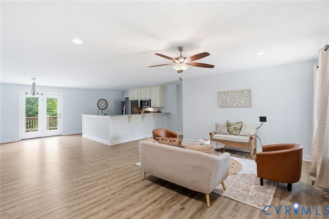 2677 Dogtown Road, Goochland, VA 23063 Open-concept living area featuring wood-finish flooring, recessed lighting, and a ceiling fan