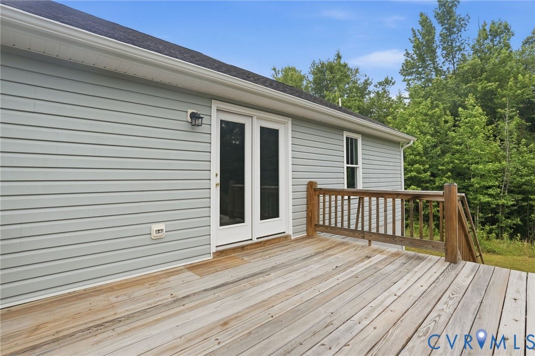 2677 Dogtown Road, Goochland, VA 23063 Wood deck with natural finish, featuring a wood railing and steps
