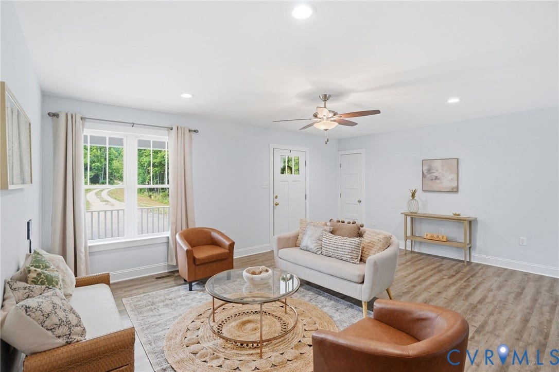 2677 Dogtown Road, Goochland, VA 23063 Bright living space featuring light-toned walls, wood-finish flooring, and recessed lighting