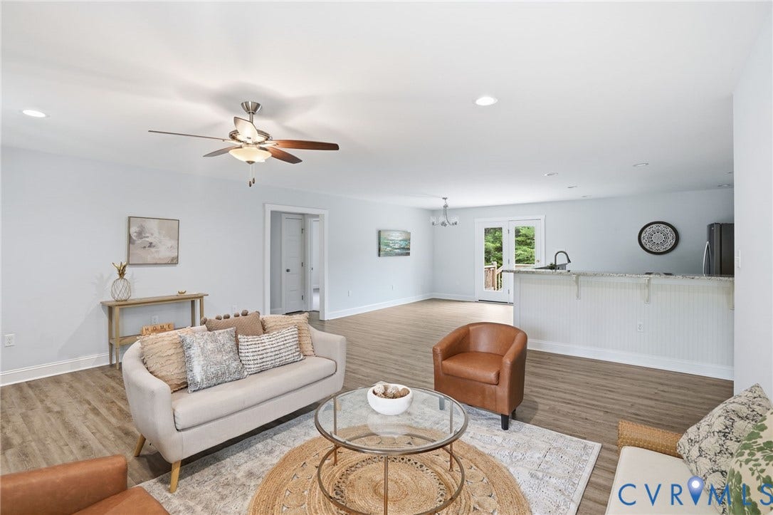 2677 Dogtown Road, Goochland, VA 23063 Open-concept living area featuring wood-finish flooring, recessed lighting, and a ceiling fan
