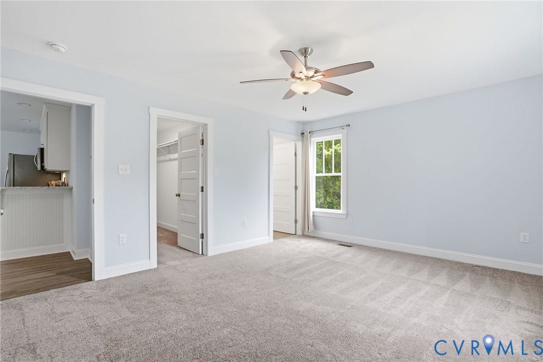 2677 Dogtown Road, Goochland, VA 23063 Spacious room with light blue walls and gray carpeting