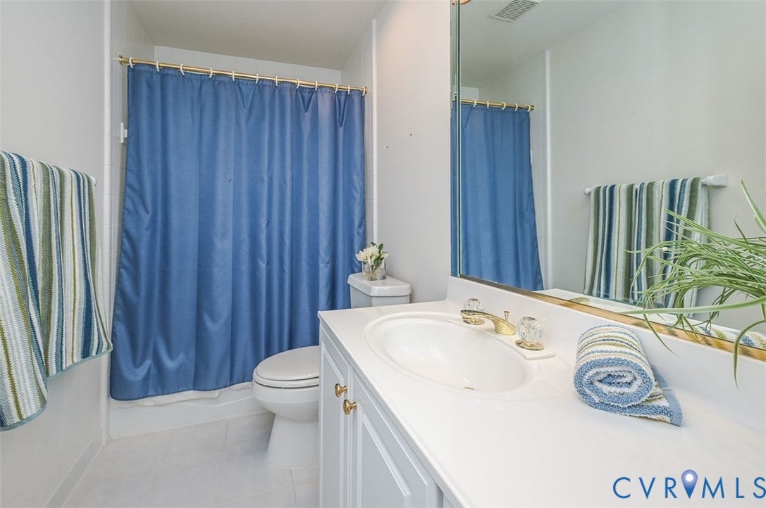 10809 Leabrook Drive, Wyndham, Glen Allen, VA 23059 Ensuite full bath to bedroom 3 with tub/shower, tile floor, cultured marble counter top