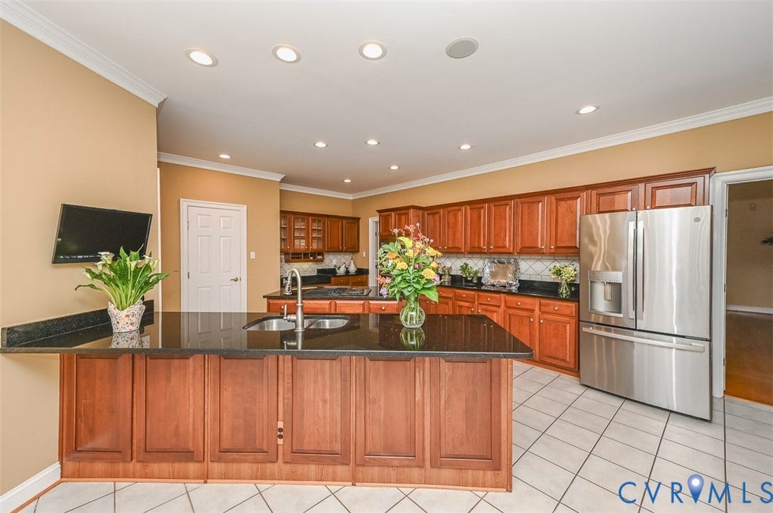 10809 Leabrook Drive, Wyndham, Glen Allen, VA 23059 Cherry cabinets, granite stainless appliance, islands. TV conveys