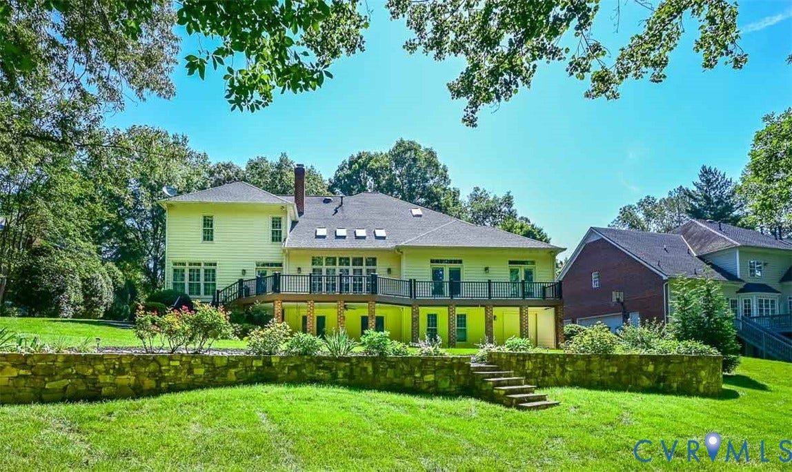 10809 Leabrook Drive, Wyndham, Glen Allen, VA 23059 Beautiful rear yard with stone retaining wall with a step down to another part of yard next to golf course