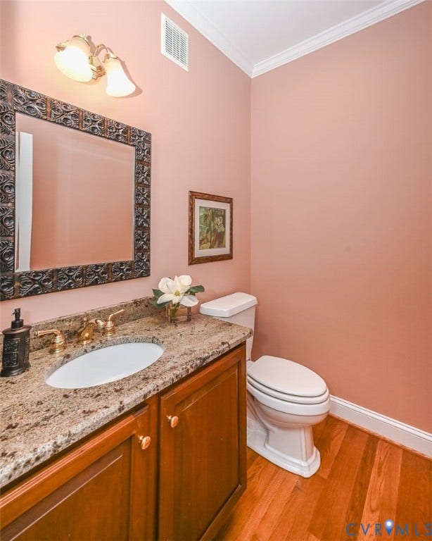 10809 Leabrook Drive, Wyndham, Glen Allen, VA 23059 Half bath with Cherry vanity, granite counter and hardwood floor