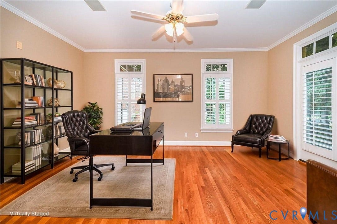 10809 Leabrook Drive, Wyndham, Glen Allen, VA 23059 Virtually staged office adjoined to the 1st floor Primary Bedroom. Doors to Exterior deck, all custom Plantation shutters
