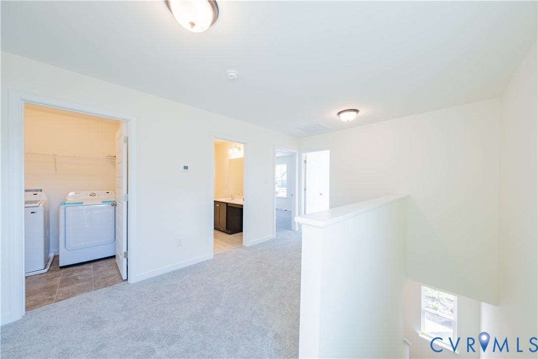 18372 Palisades Court, Chesterfield, VA 23120 Upper level hallway with neutral wall tones and carpeted flooring