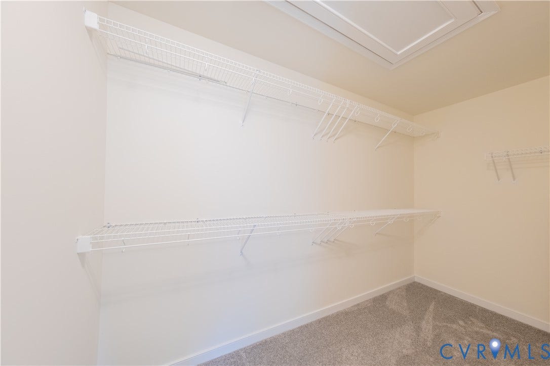 18372 Palisades Court, Chesterfield, VA 23120 Interior closet with wire shelving system, light-colored walls, and gray carpet flooring