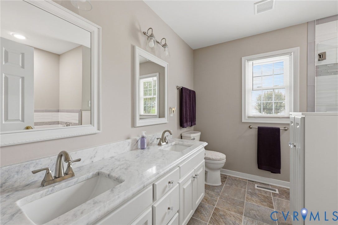 4320 Stebbins Street, Chester, VA 23831 Dual vanity with marble countertop, tile flooring