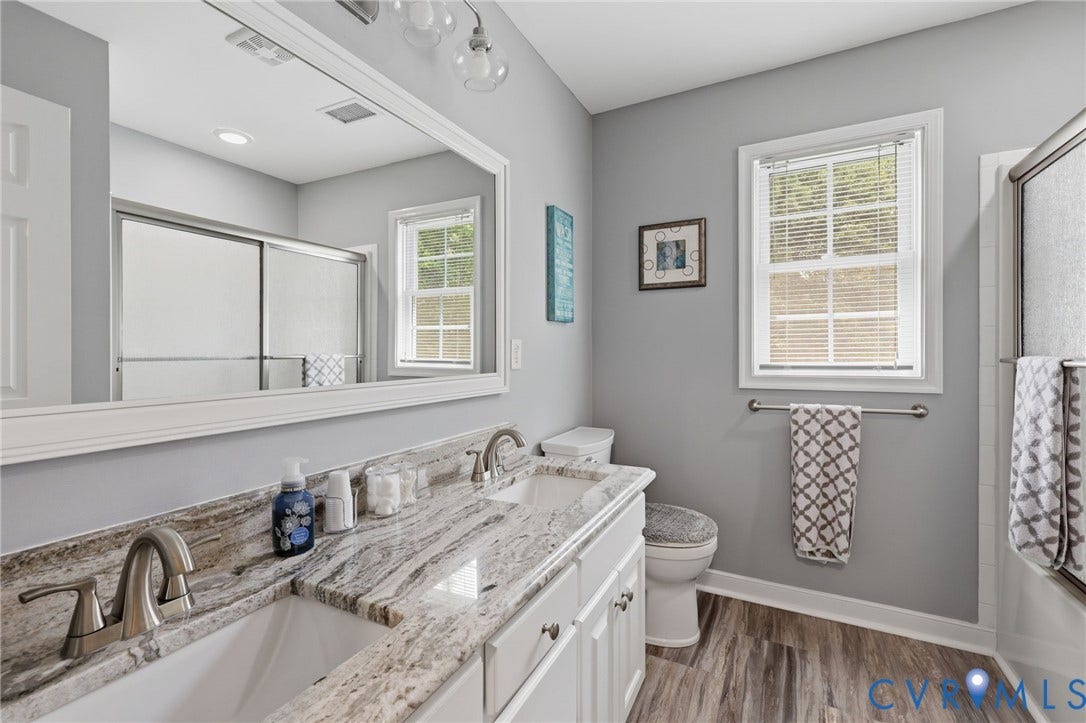 4320 Stebbins Street, Chester, VA 23831 upstairs full bath with double vanity, soft close drawers and tile tub surround