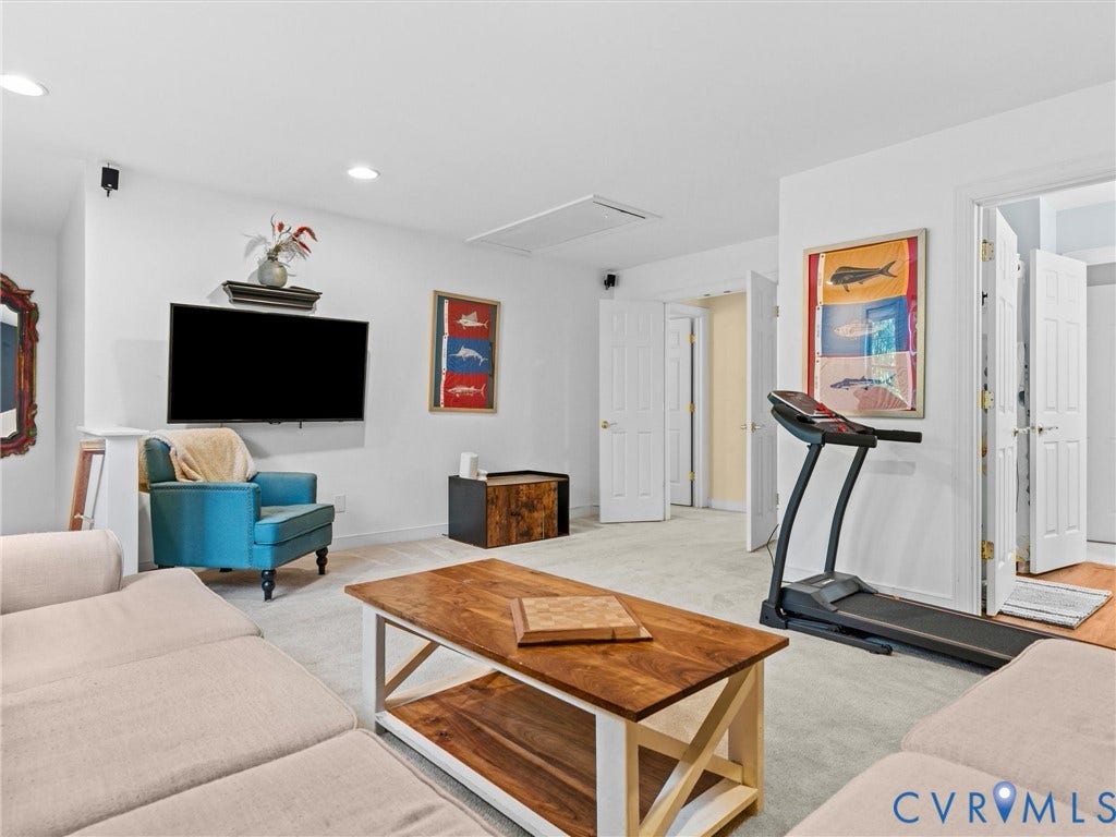 2nd floor rec room w/ rear stairwell to kitchen