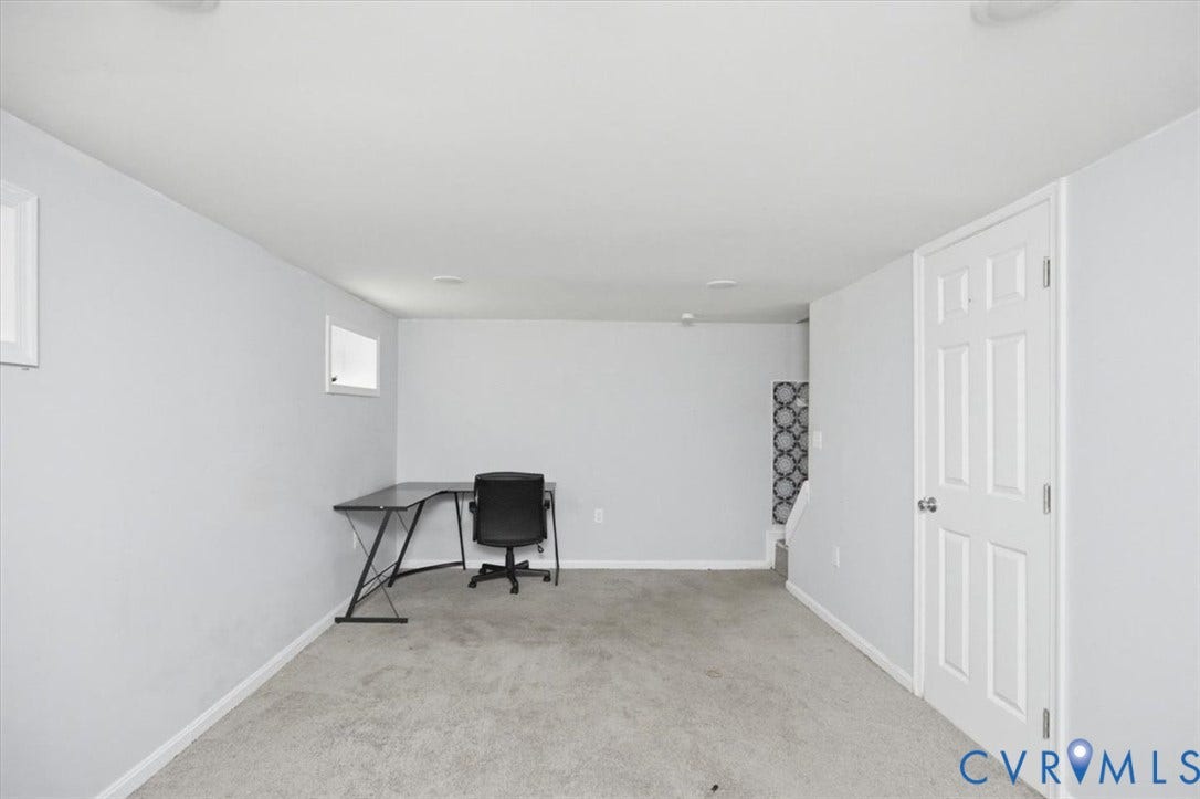 125 Richmond Avenue, Colonial Heights, VA 23834 Spacious room featuring light gray walls and recessed lighting