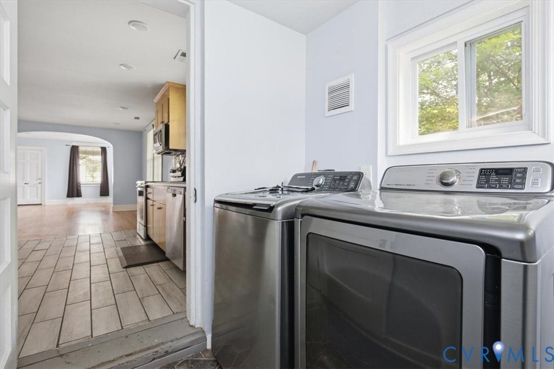 125 Richmond Avenue, Colonial Heights, VA 23834 Dedicated laundry area with a large window, light blue wall paint, and tile flooring